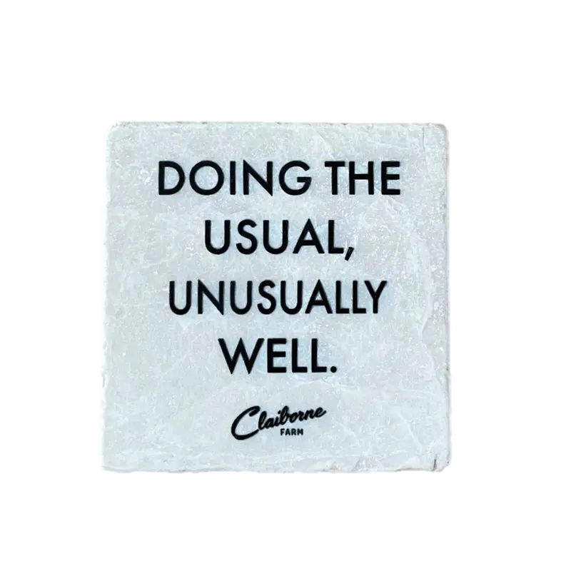 "Doing The Usual, Unusually Well" Motto Marble Coaster 1