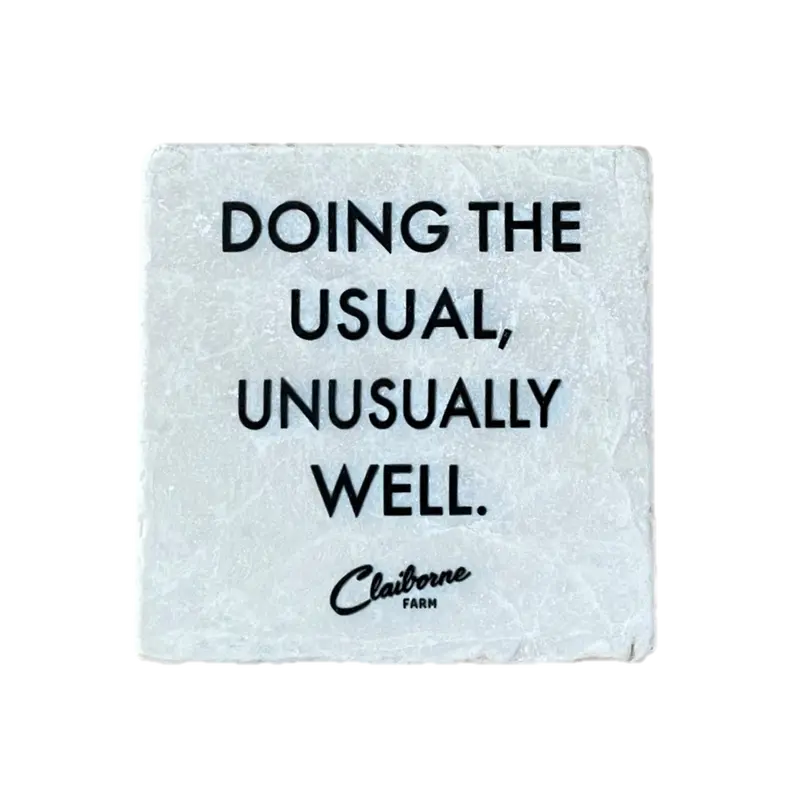 "Doing The Usual, Unusually Well" Motto Marble Magnet 1